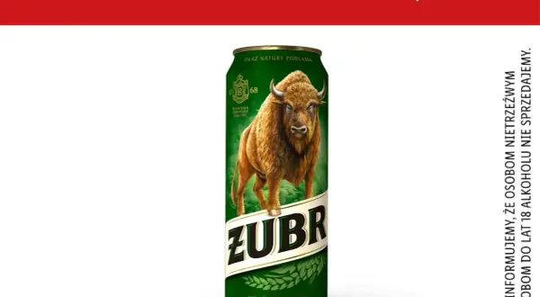 Puszczański Żubr na puszce piwa. 1/2 litra piwa Żubr zawiera 25g czystego alkoholu. Sprzedaż alkoholu osobom do lat 18 jest przestępstwem.