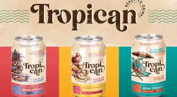 Trzy puszki z napojem "Tropican" o smaku limonki, pomarańczy i marakui. Idealne na lato!